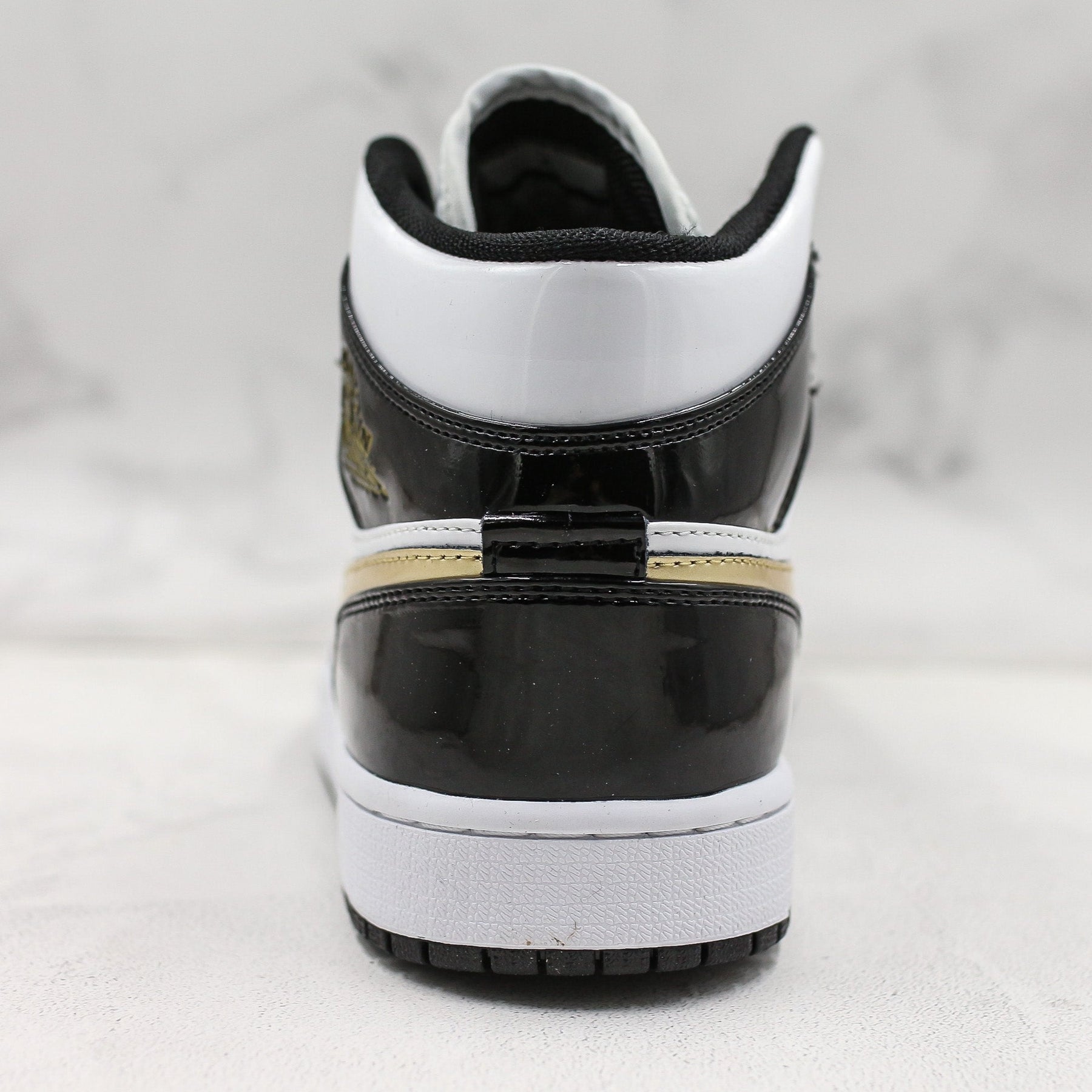 Air Jordan 1 Mid Patent Black White Gold